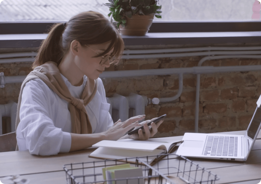 Girl Writting on a desk image